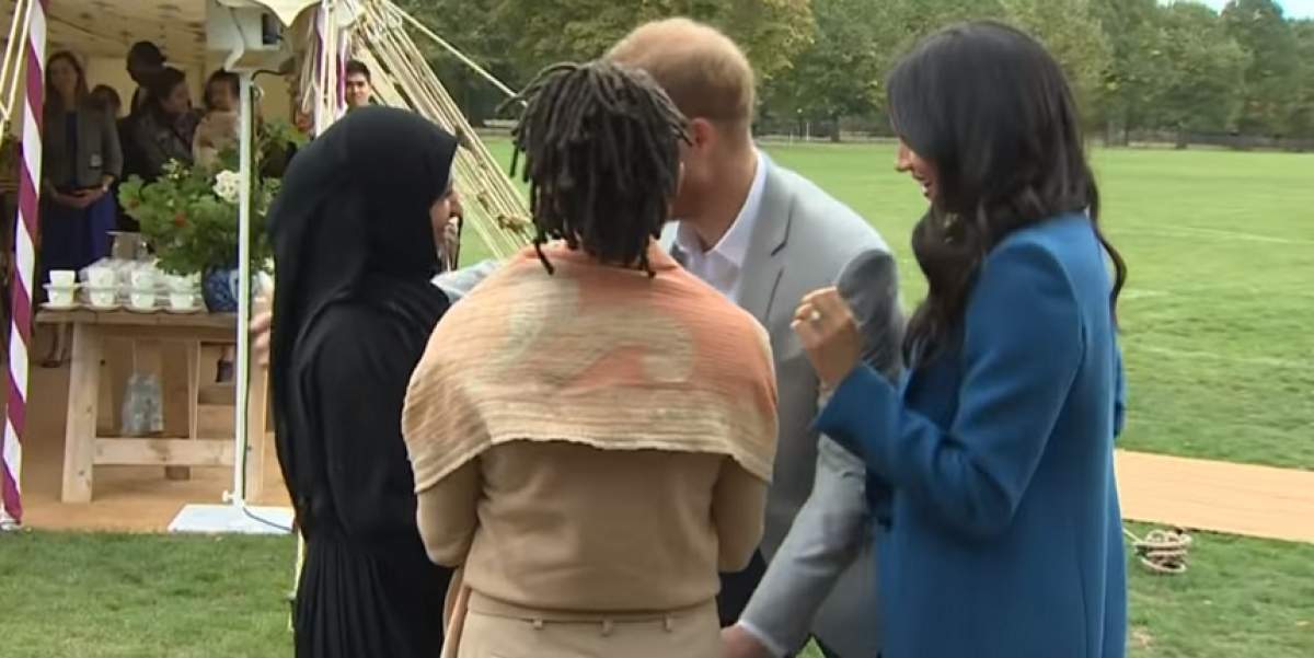 VIDEO / Imaginile momentului! Prințul Harry a sărutat o femeie chiar sub ochii lui Meghan Markle
