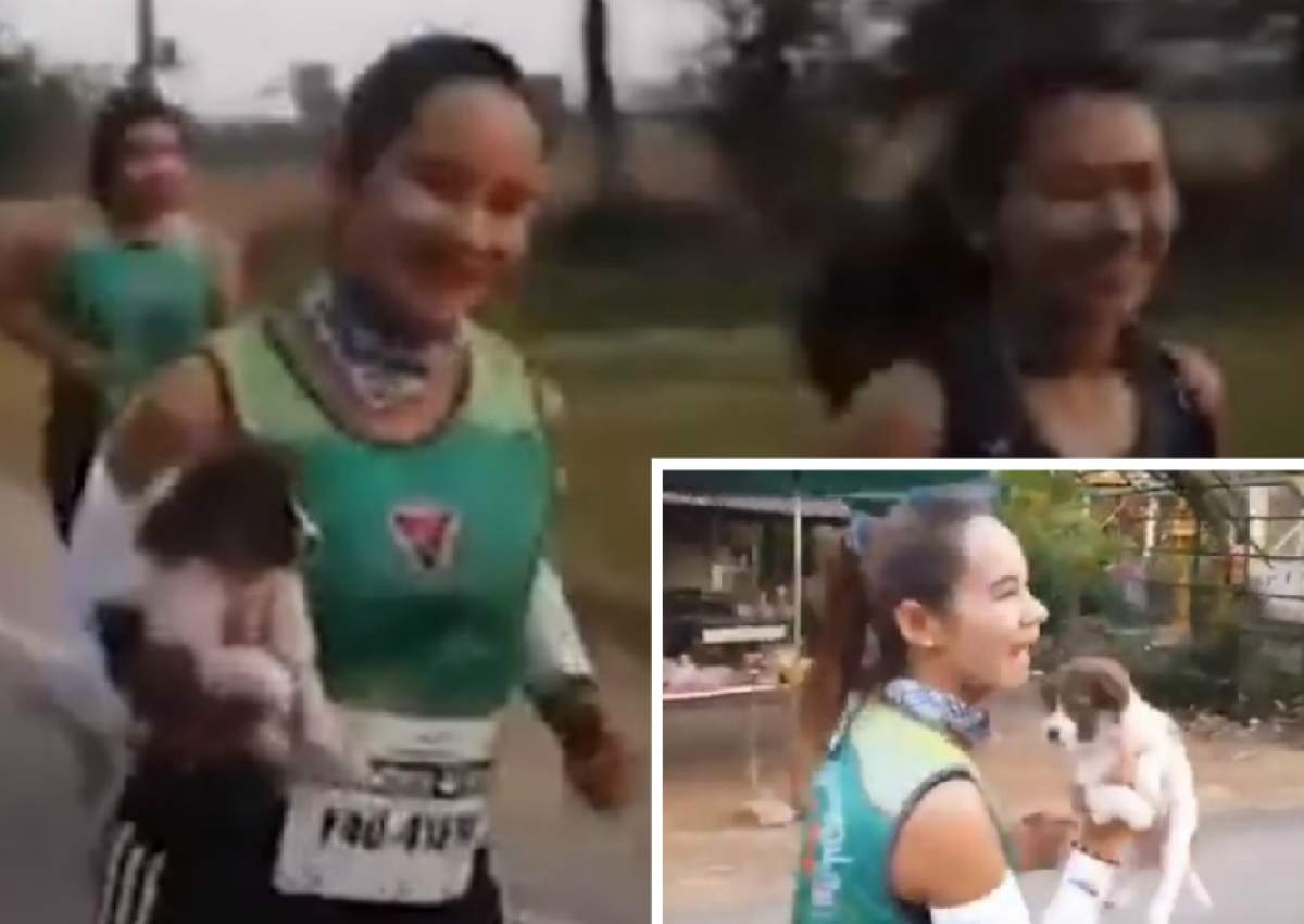 O tânără a alergat 20 de kilometri cu un căţeluş în braţe! Maratonista i-a emoţionat pe toţi de la linia de sosire