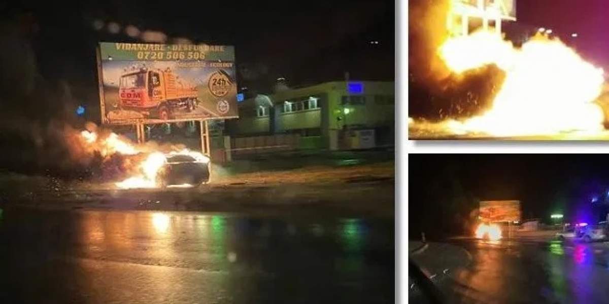 Un șofer a plonjat cu mașina peste un sens giratoriu, la Oradea! Mașina a izbucnit în flăcări. FOTO