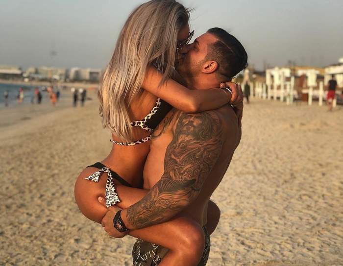 Bianca Drăgușanu și Alex Bodi, ipostaze „ilegale” pe plaja din Dubai. Au dat frâu liber pasiunii!