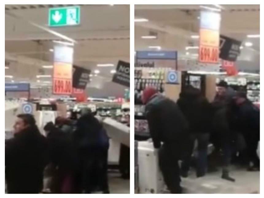 VIDEO / Scene haotice într-un supermarket din Bacău! Oamenii s-au bătut pe televizoare la  promoţie