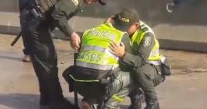 FOTO / Imagine tulburătoare. Polițiștii au izbucnit în lacrimi, după ce o femeie s-a aruncat de pe pod, împreună cu fiul de 10 ani