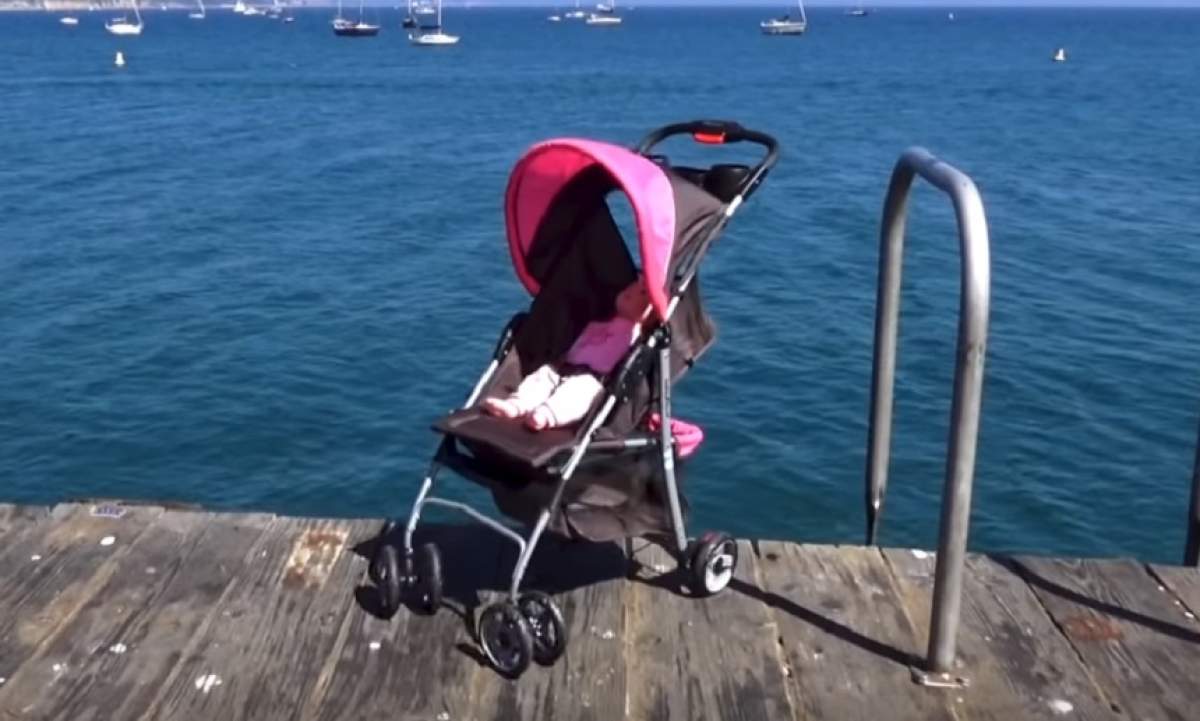 Copil de 3 ani, aruncat de vânt cu tot cu cărucior în mare. Ce s-a întâmplat cu micuțul