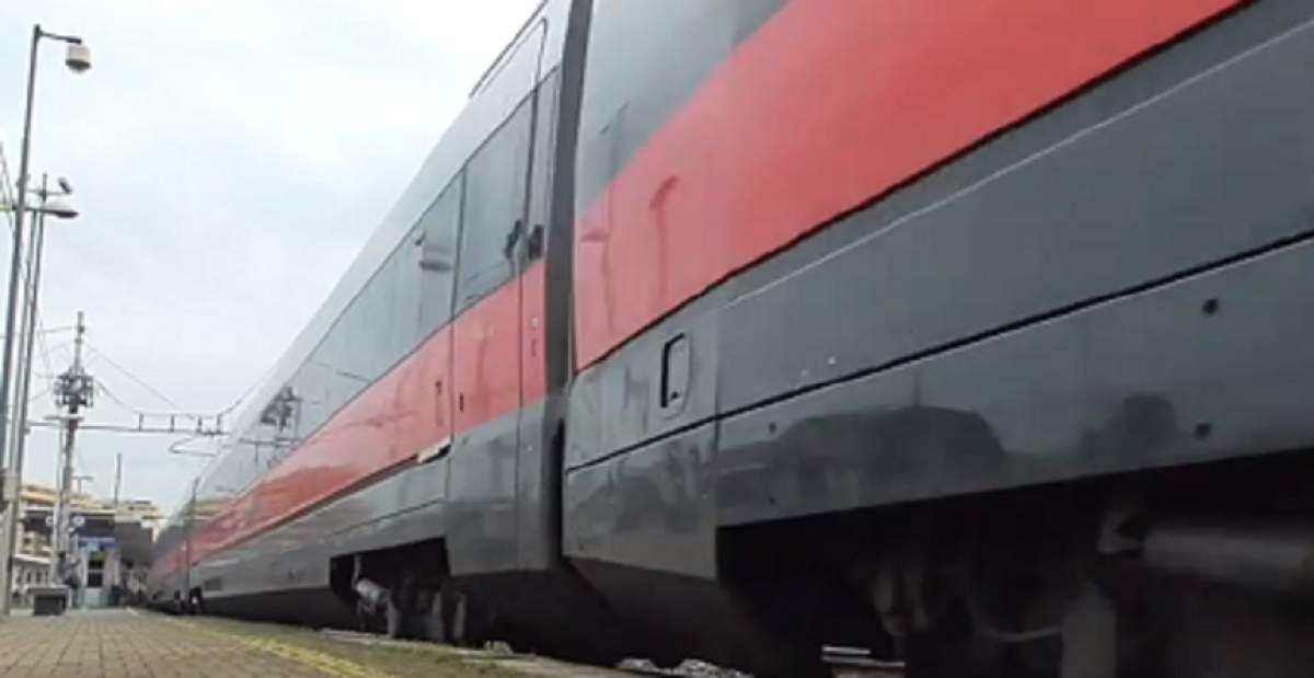 Român condamnat la închisoare în Italia, după ce a aruncat o piatră în geamul trenului