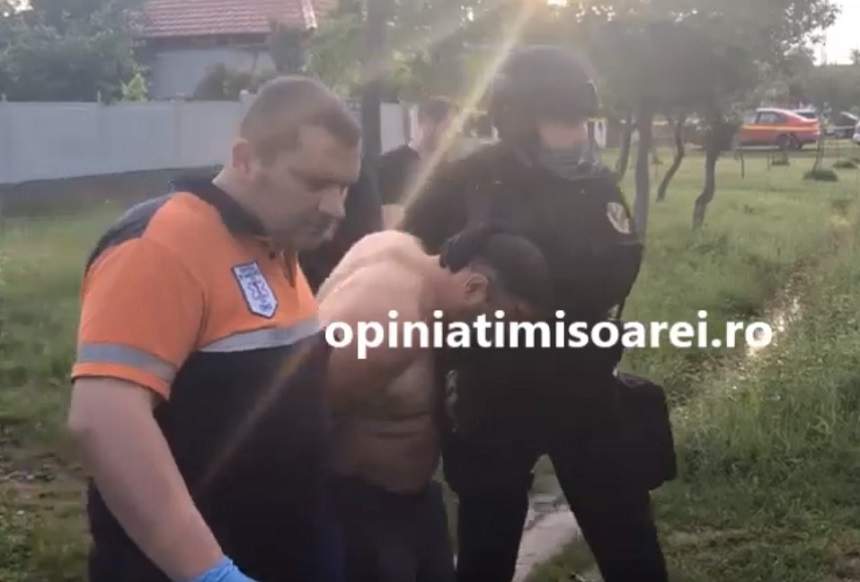 Criminalul din Timiş era pregătit să ucidă din nou! Poliţiştii l-au găsit cu pistolul la brâu