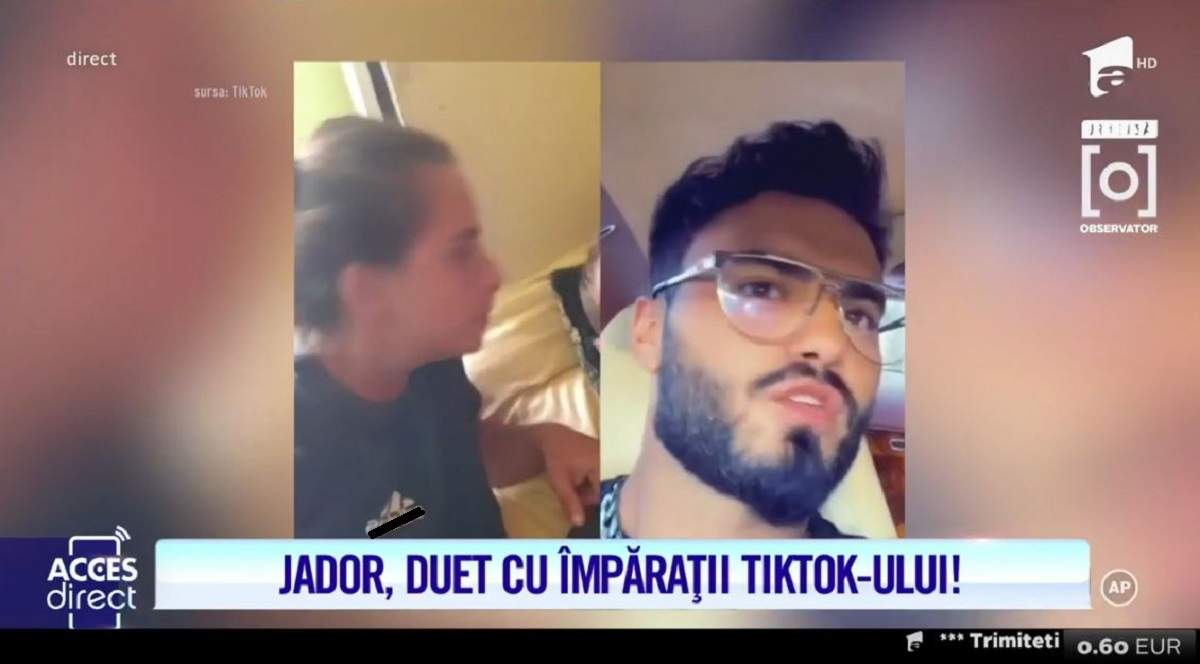 Alexandra Bodi poartă un tricou negru. Jador trimite pupici virtuali.