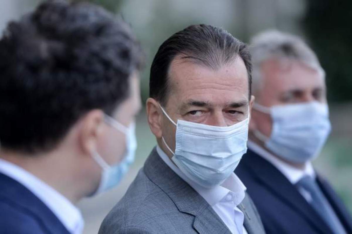 Ludovic Orban cu masca de protecție.
