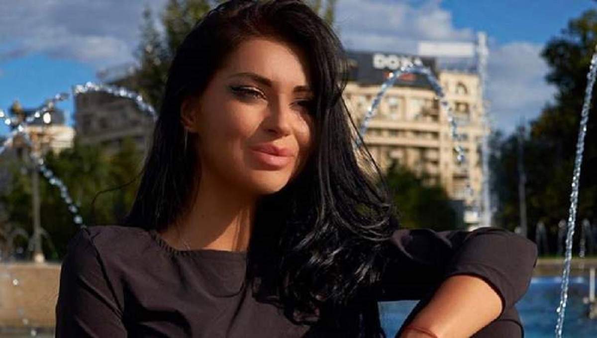 Elena Ionescu poarta o bluza neagra si parul desprins
