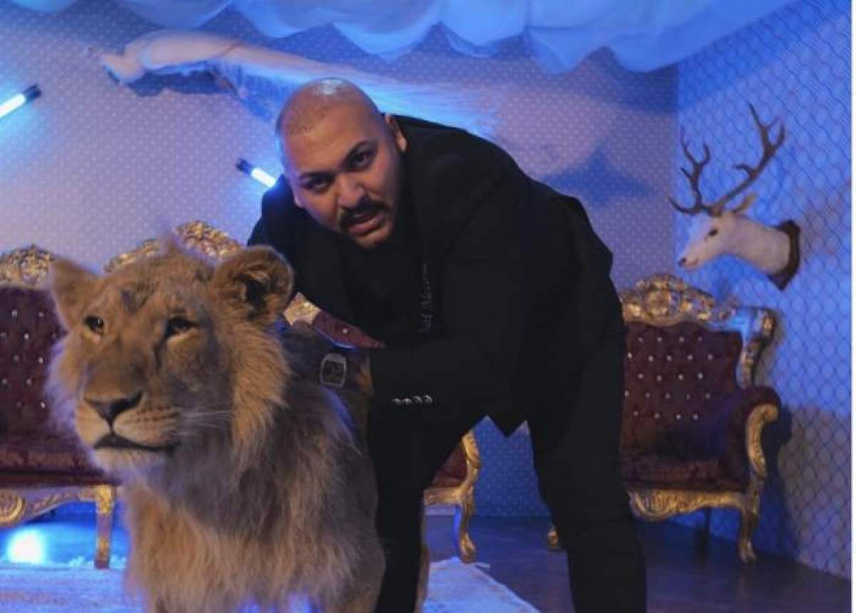 Dani Mocau și leul rănit, în timpul filmărilor pentru videoclip