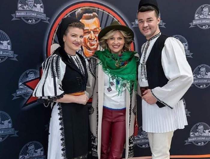 Mirela Vaida, Dumitru Stroie și Claudia Olaru se află la un eveniment. Cântărețul își deschisese un magazin.