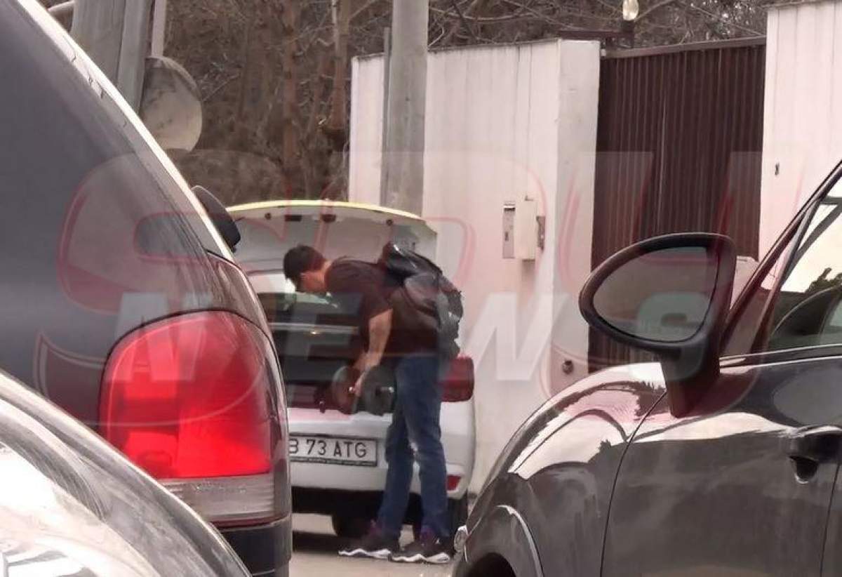 VIDEO PAPARAZZI / Primele imagini cu George Burcea, după ce Andreea Bălan a confirmat despărţirea! Actorul îşi cară lucrurile din fosta locuinţă, cu taxiul
