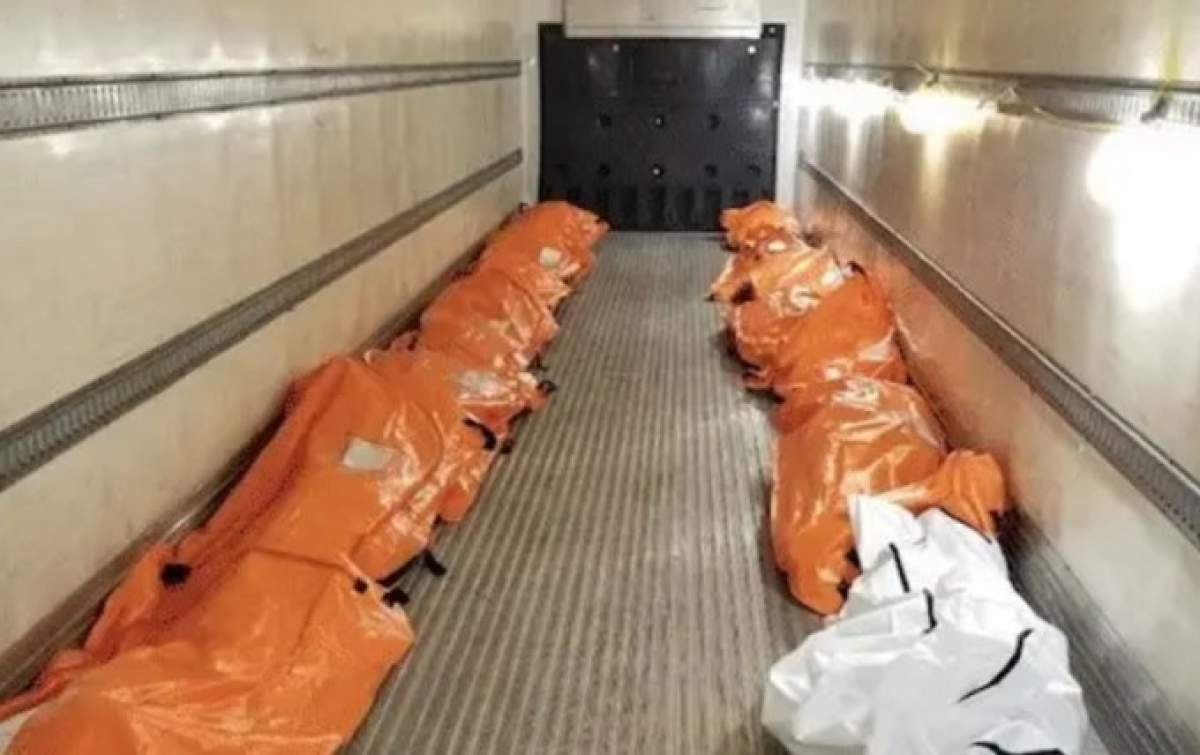 Imagini cutremurătoare! Trupurile victimelor de coronavirus aliniate într-un camion frigorific