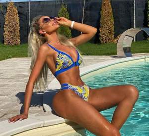 FOTO / Nici nu a venit încă vară, dar Bianca Drăgușanu deja a scăpat de haine! Blonda sexy s-a fotografiat în piscină cu formele la înaintare