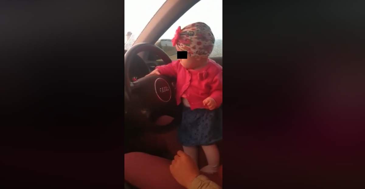 Inconștiență dusă la extrem! Un bărbat din Cluj și-a pus fetița de doar câțiva ani să conducă mașina. ”Uită-te în față la drum”