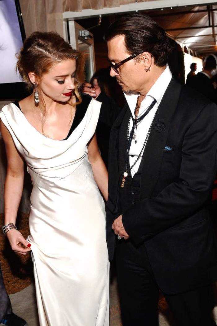 Războiul dintre Johnny Depp și Amber Heard continuă! Fosta soție, imagini compromițătoare cu actorul / FOTO