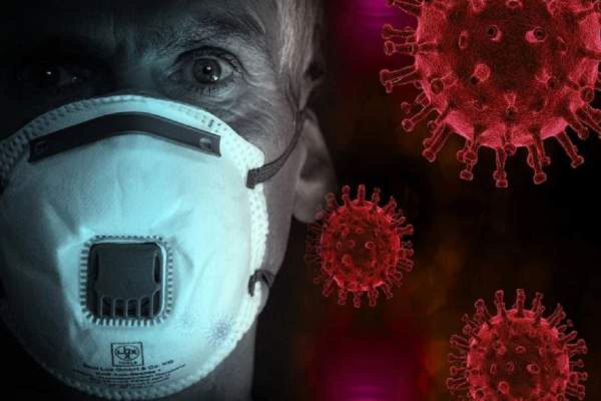 bărbat cu mască de protecţie anti-coronavirus