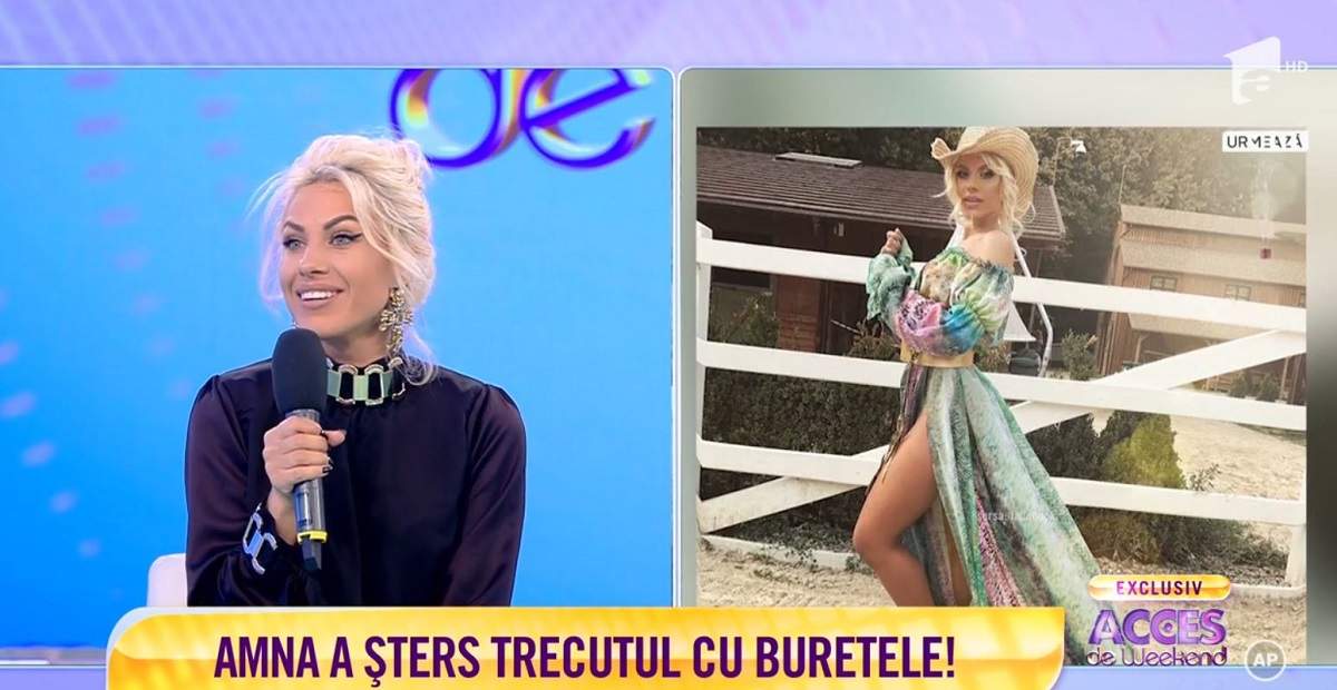 Amna este la „Acces Direct”. Artista poartă o rochie neagră și ține microfonul în mână