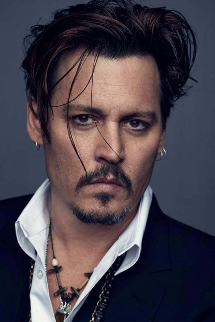 Johnny Depp este ăntr-o ședință foto