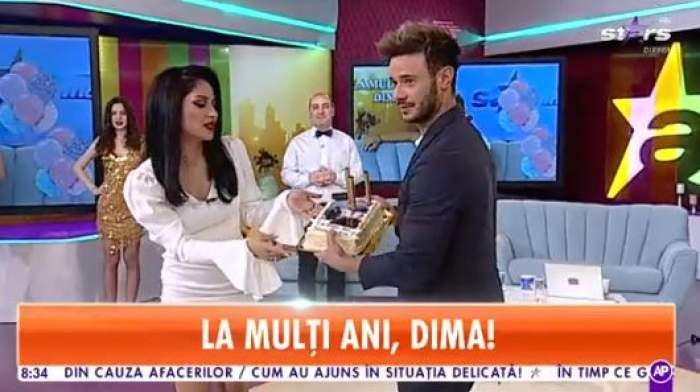 Dima Trofim și Nasrin, zâmbitori, cu un delicios trot de frișcă în mână