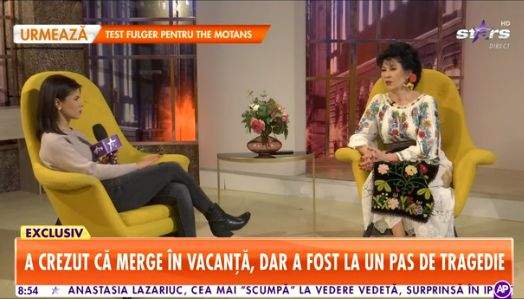 Neta Soare, în ținută tradiționaă oferă un interviu reporterului Antena Stars