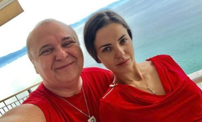 Nick Radoi si Madalina Apostol s-au fotografiat pe terasa la mare, amandoi sunt imbracati in rosu