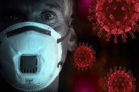 Un om cu mască d protecție și semnul coronavirusului