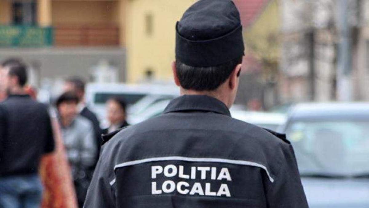 Un polițist a fost bătut în fața casei