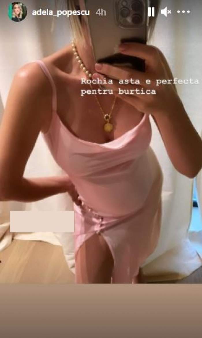 Adela Popescu în rochie mulată, roz.