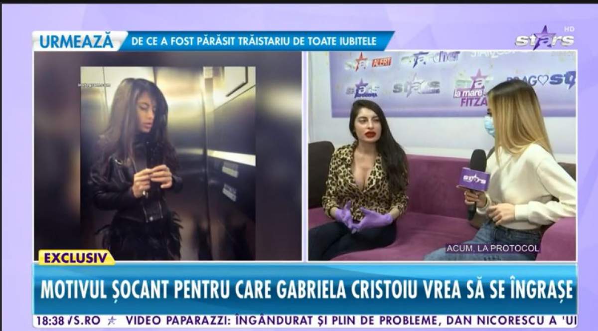 Gabriela Cristoiu este la Antena Stars, sta pe canapea, poarta o bluza cu decolteu cu animal print si pantaloni negri