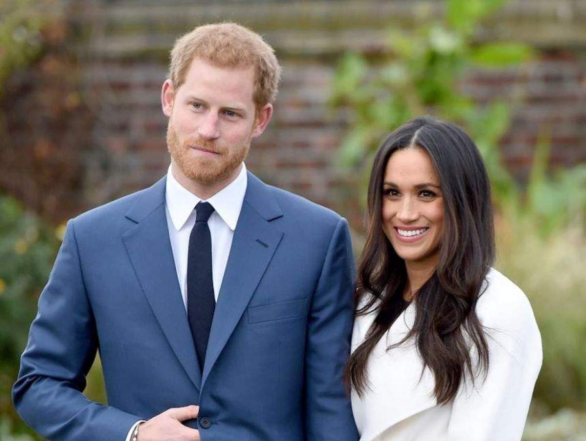 printul harry si meghan markle afara