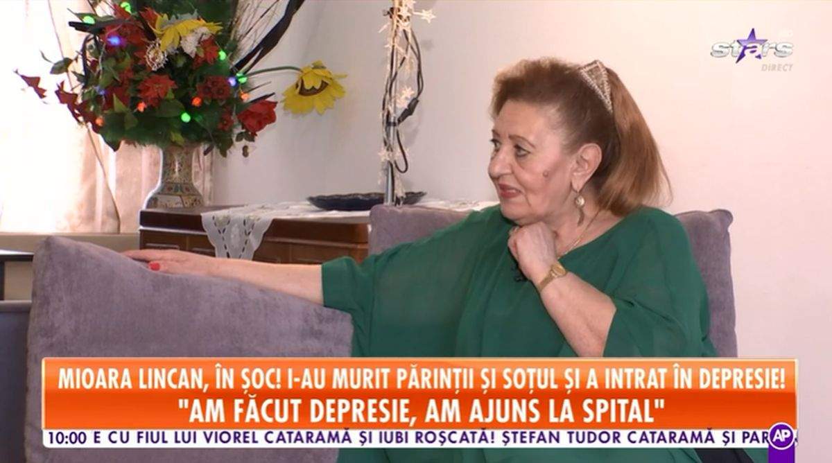 mioara lincan imbracata in verde sta pe canapea si ofera un interviu pentru antena stars