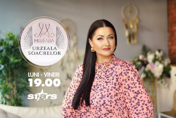 gabriela cristea intr-o bluza roz cu flori