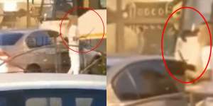 Noi imagini cu atacul șocant din traficul din București. Partenera bărbatului violent a ieșit din mașină cu o macetă în mână, dar a renunțat la ea / VIDEO