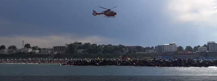 Un copil de 7 ani a fost scos din apă de salvamari, la Eforie Nord. Băiețelul a fost preluat de elicopterul SMURD / FOTO