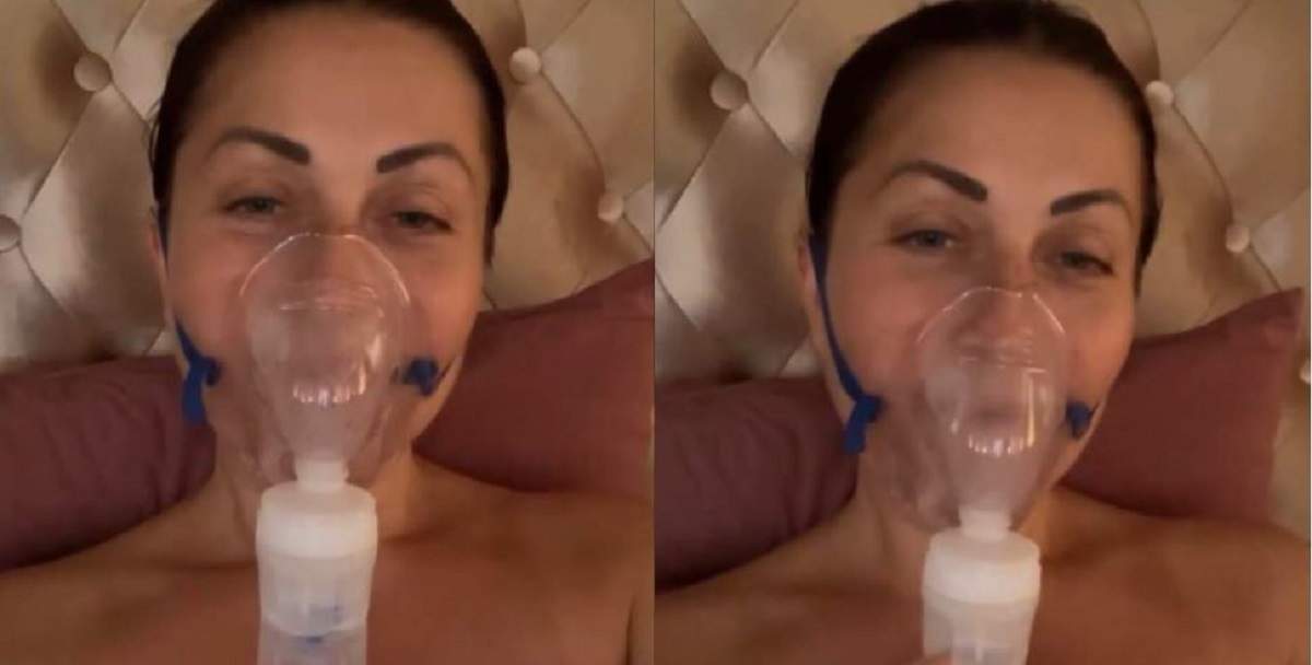 Gabriela Cristea e în pat și poartă mască cu aerosoli.