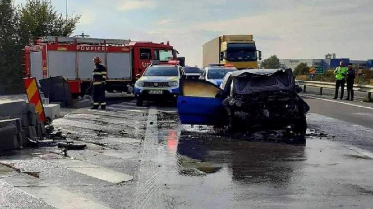 Accident grav între un autocar şi un autoturism pe Autostrada Pitești - București. În urma impactului, mașina a luat foc / FOTO