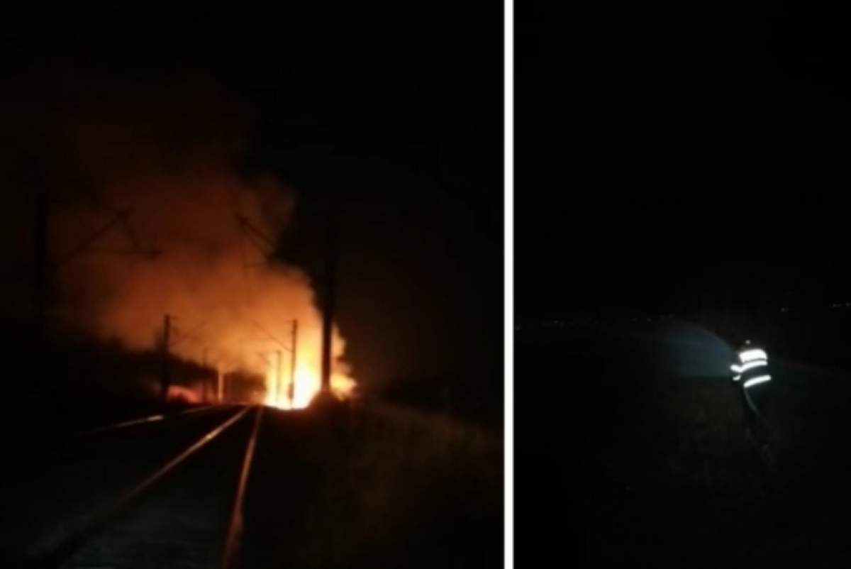 Incendiu de vegetaţie, în județul Prahova. Focul a ajuns aproape de calea ferată, iar pasagerii din tren au tras o sperietură soră cu moartea / FOTO