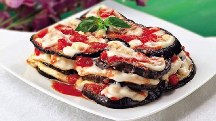 Vinete cu mozzarella în sos de roșii. Rețeta ideală pentru pofticioși