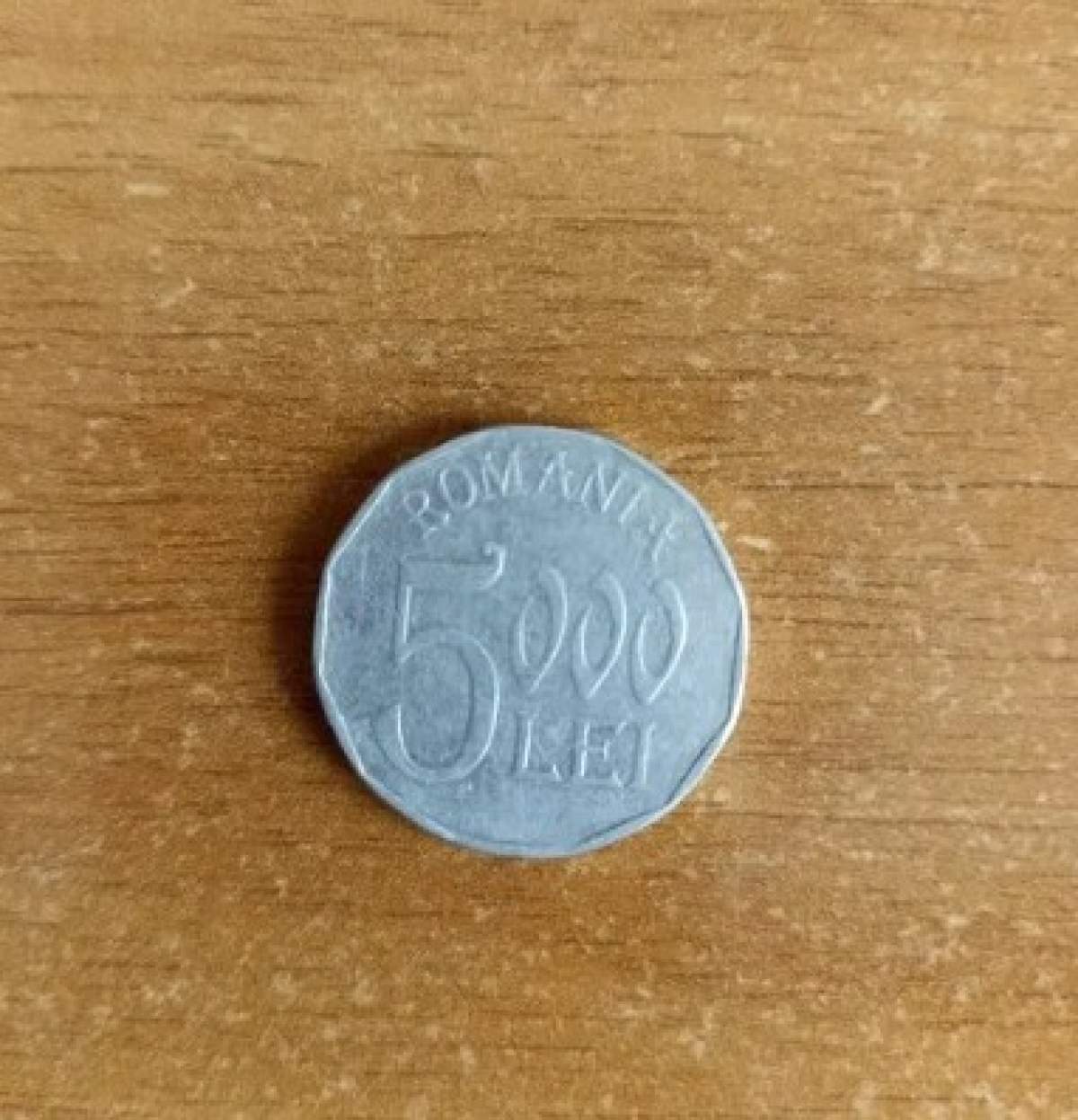 Moneda de 5000 de lei se vinde acum cu o sumă frumoasă pe OLX. Cât costă acum