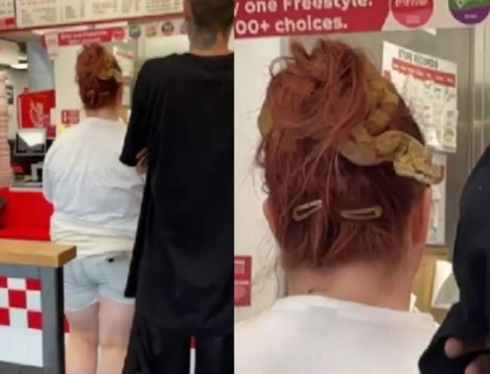 Imagini șocante surprinse într-un fastfood. O clientă care își aștepta rândul și-a prins părul cu un șarpe / VIDEO