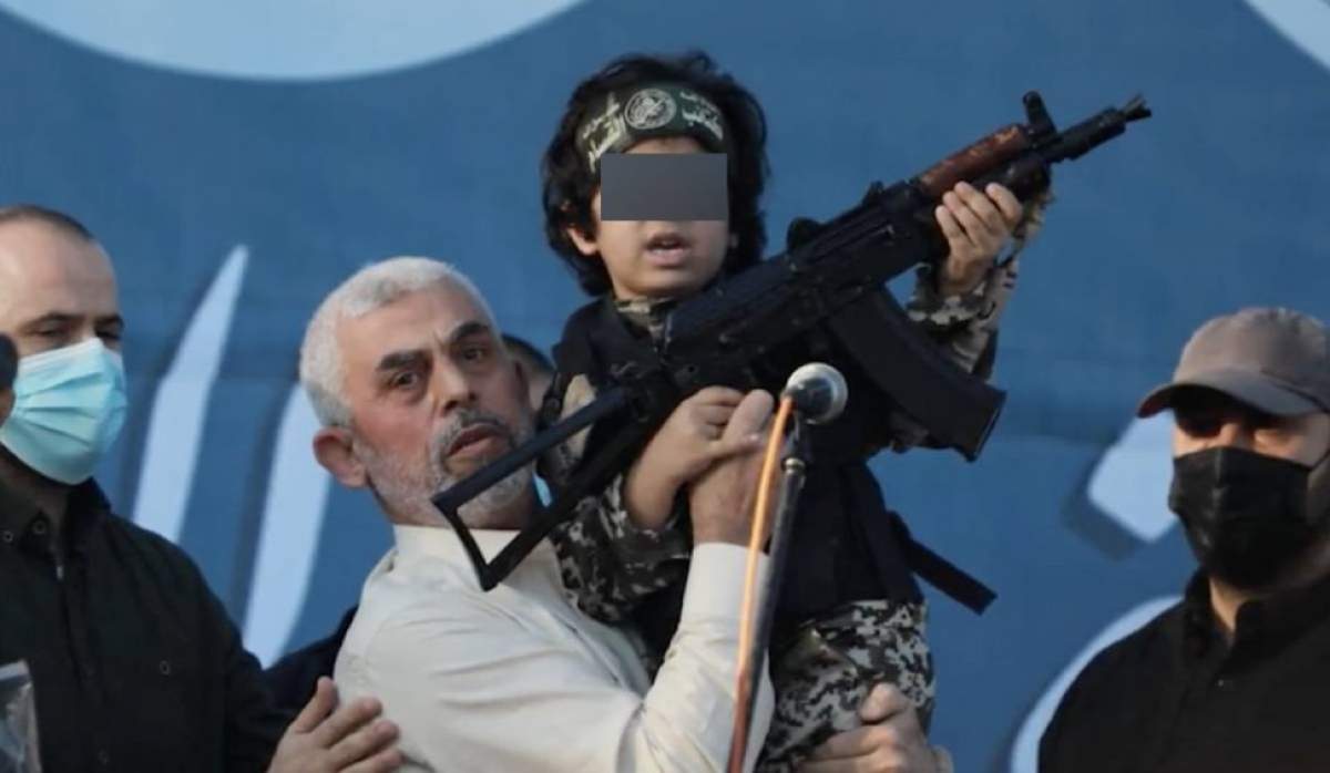 Liderul vrea să învingă Israel. liderul Yahya Sinwar și un băiețel