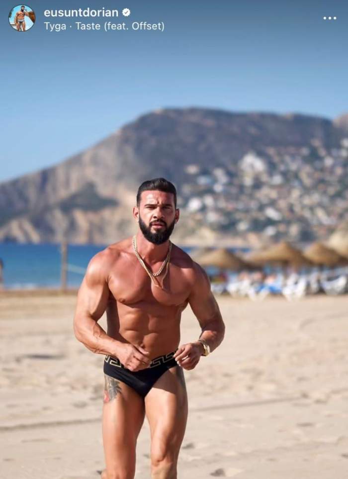 Dorian Popa aleargă pe plajă și face sport