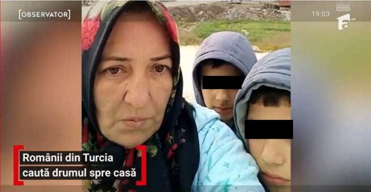 O româncă și cei doi copii au rămas pe străzi, după ce blocul în care locuiau s-a dărâmat