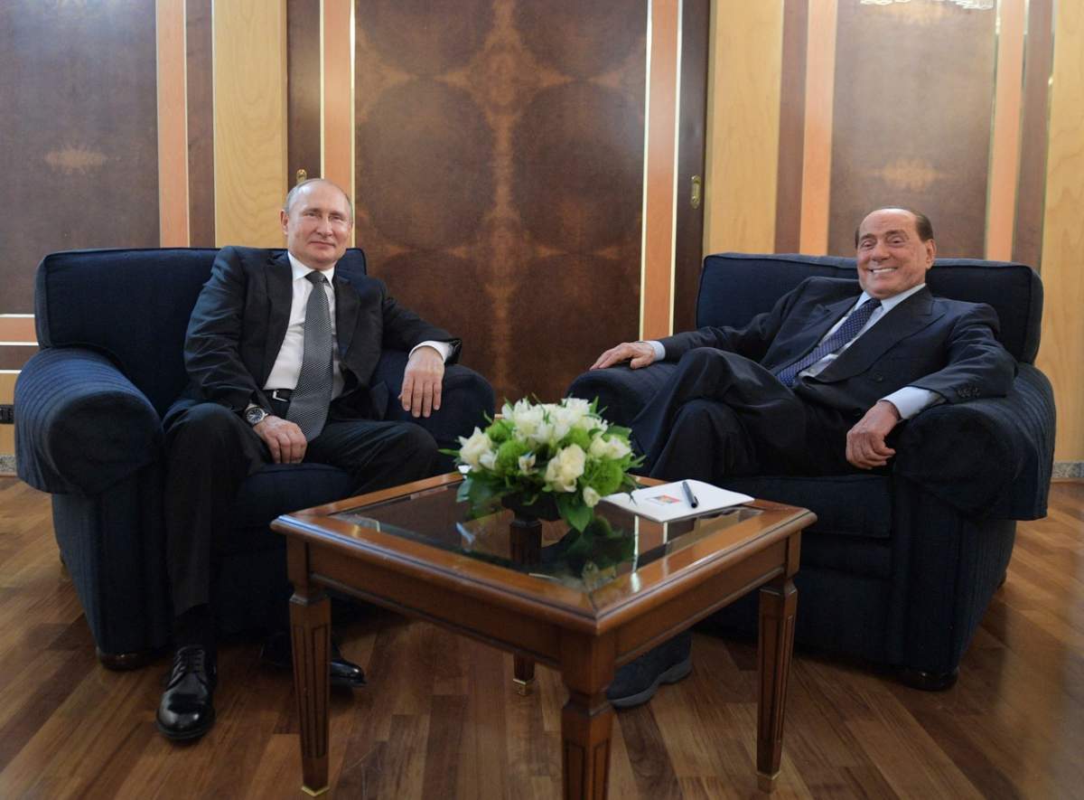 vladimir putin si silvio berlusconi pe fotolii diferite, 4 iul. 2019