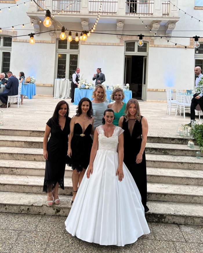 Dublă petrecere pentru Cătălina Ponor! Fosta gimnastă s-a cununat religios şi şi-a botezat fiul. Imagini de la cele două evenimente / FOTO