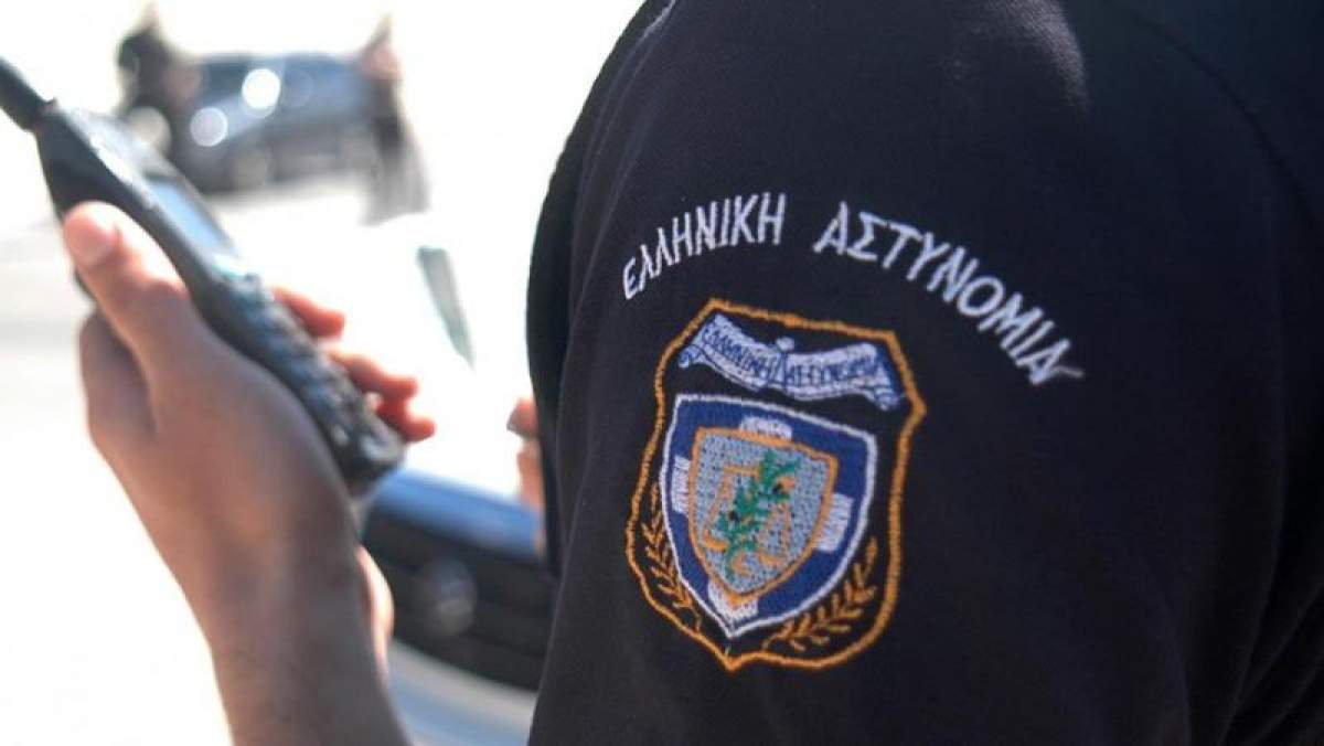 Imagine cu polițist grec
