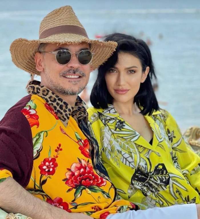 Răzvan și Daliana Răducan în vacanță, el poartă o pălărie