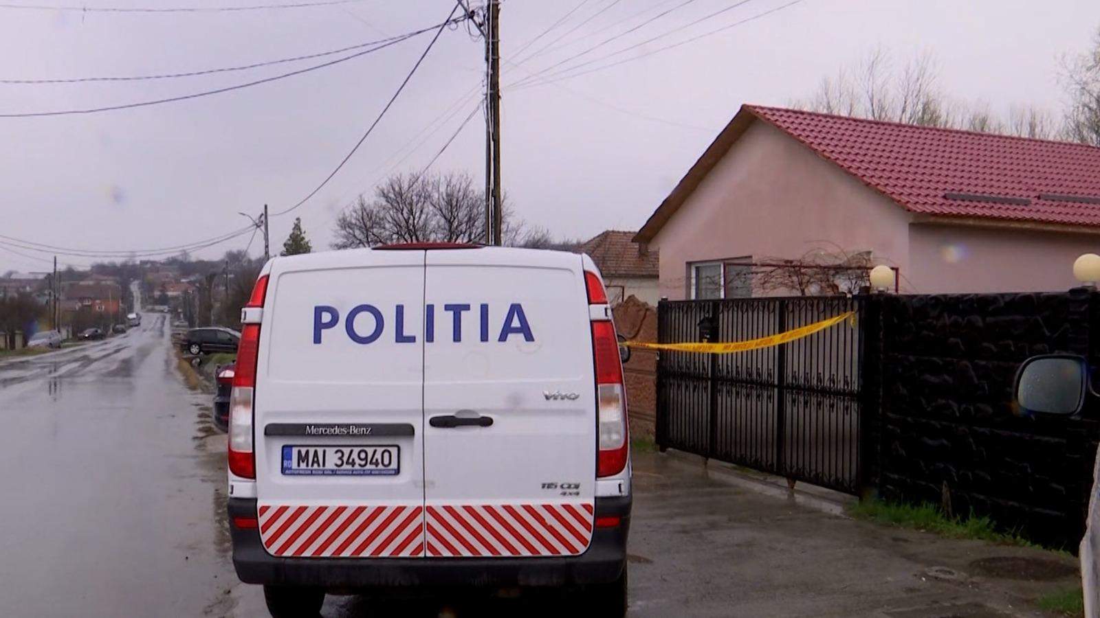 mașină de poliție la locul crimei