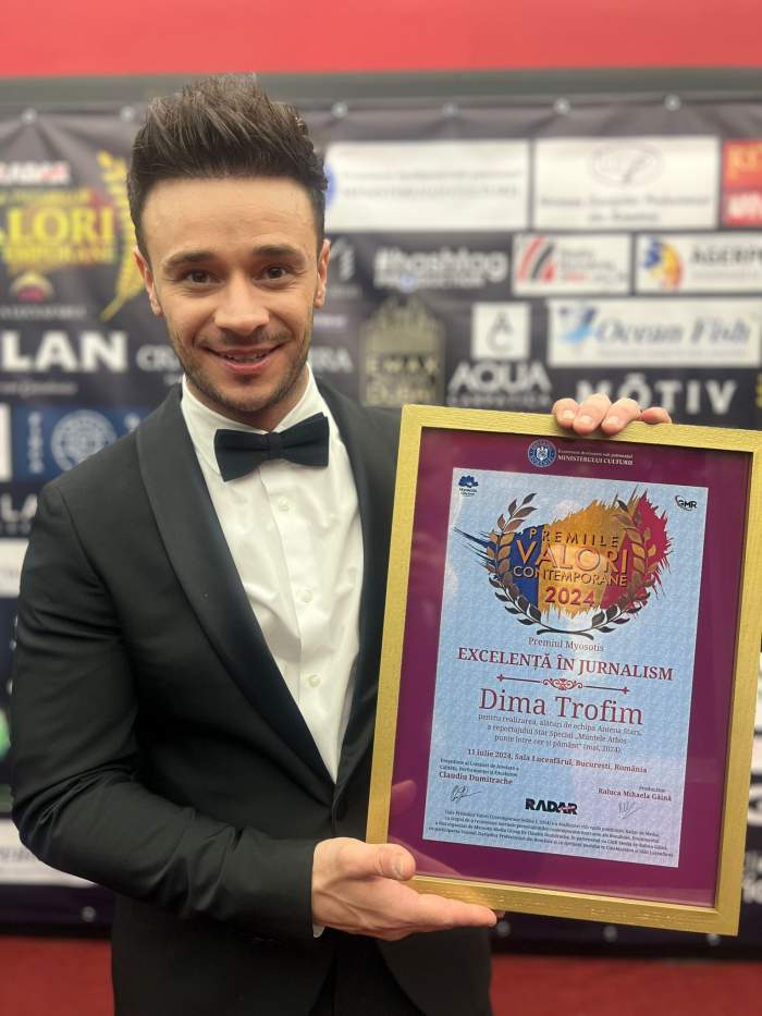 dima trofim cu premiul în mână