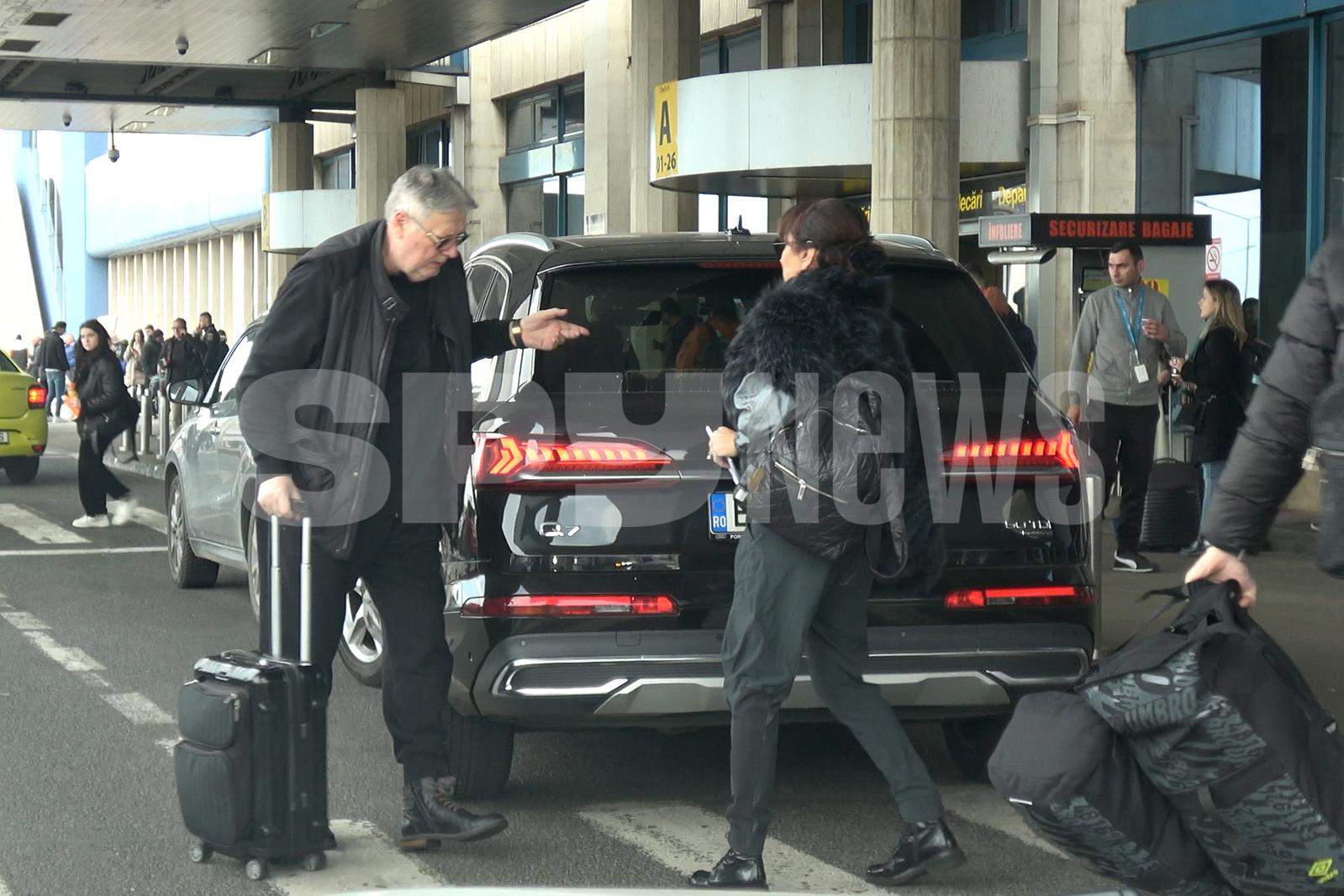 Imagini emoţionante cu Gino Iorgulescu şi soţia! Cum îşi iau la revedere cei doi la aeroport | PAPARAZZI